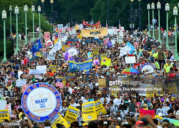 Overview of thousands marching on the Kutz Bridge during the 50th Anniversary of March On Washington in Washington, DC on August 24, 2013. The March...