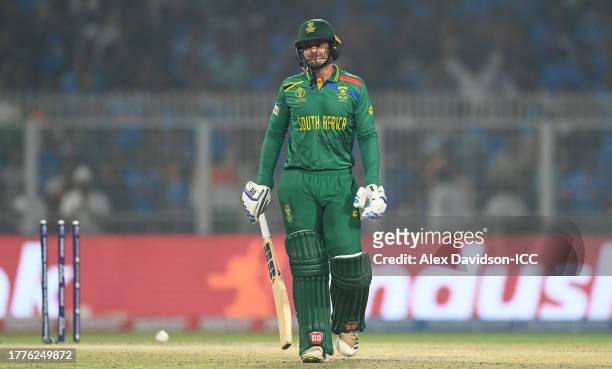 Quinton de Kock of South Africa makes their way off after being dismissed during the ICC Men's Cricket World Cup India 2023 between India and South...