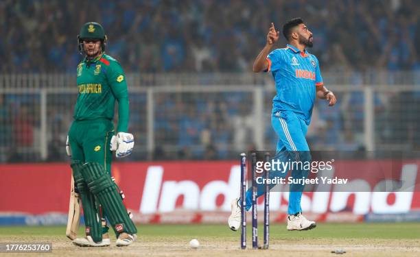 Mohammed Siraj of India celebrates the wicket of Quinton de Kock of South Africa during the ICC Men's Cricket World Cup India 2023 between India and...