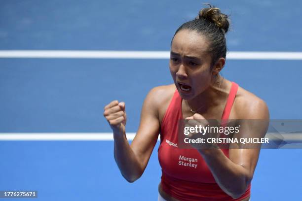 Canada's Leylah Fernandez celebrates defeating Czech Republic's Marketa Vondrousova during the semifinal singles tennis match between Czech Republic...