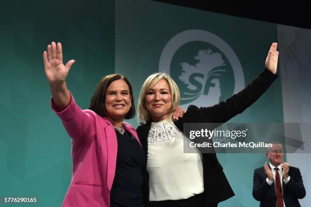 Sinn Fein president Mary Lou McDonald and vice-president Michelle O'Neill wave to the conference during the Sinn Fein Ard Fheis on November 11, 2023...