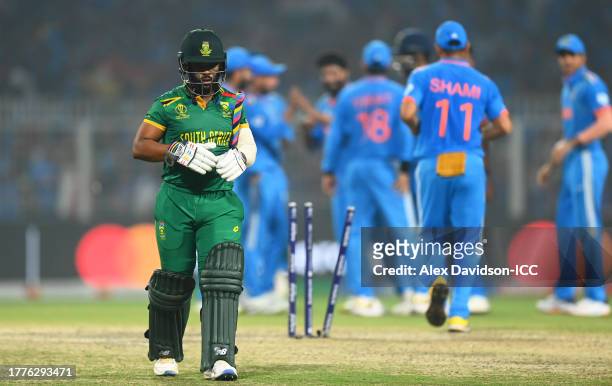 Temba Bavuma of South Africa makes their way off after being dismissed during the ICC Men's Cricket World Cup India 2023 between India and South...