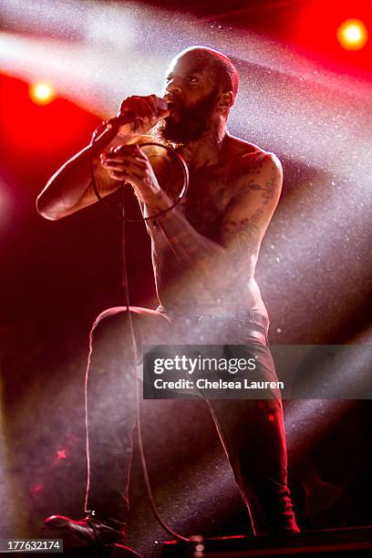 Vocalist Stefan "MC Ride" Burnett of Death Grips performs at the 10th annual FYF music festival at Los Angeles Historical Park on August 24, 2013 in...