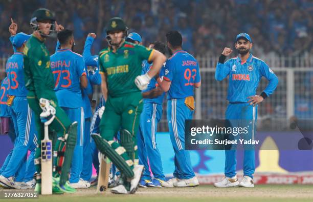 Virat Kohli of India celebrates the wicket of Rassie van der Dussen of South Africa during the ICC Men's Cricket World Cup India 2023 between India...