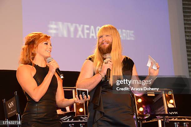 Amy Paffrath and P'Trique attend the NYX Cosmetics FACE Awards at Beautycon at Siren Studios on August 24, 2013 in Hollywood, California.