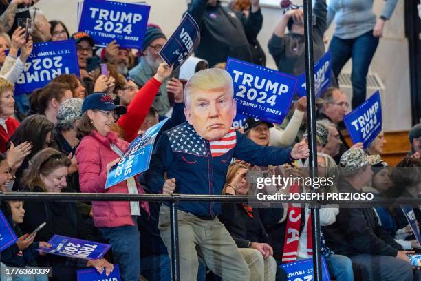 Supporters attend a campaign rally of former US president and 2024 Republican president candidate Donald Trump in Claremont, New Hampshire, on...