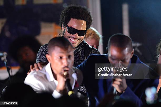 Pharrel, Lenny Kravitz and Jamie Foxx perform at the 4th Annual Apollo In The Hamptons Benefit on August 24, 2013 in East Hampton, New York.