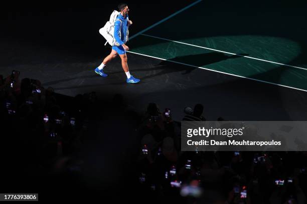 Novak Djokovic of Serbia makes his way out to the court for the Men's Singles final against Grigor Dimitrov of Bulgaria on day seven of Rolex Paris...