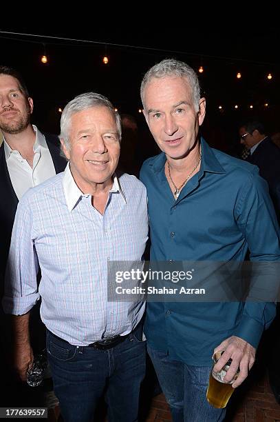 John McEnroe and Robert Kraft attend 4th Annual Apollo In The Hamptons Benefit on August 24, 2013 in East Hampton, New York.