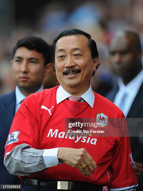 Cardiff City owner Tan Sri Dr Vincent Tan looks on before the Barclays Premier League match between Cardiff City and Manchester City at Cardiff City...