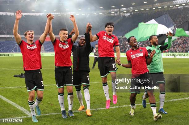 The Players of Hannover 96 celebrate following the team's victory during the Second Bundesliga match between Hannover 96 and Eintracht Braunschweig...