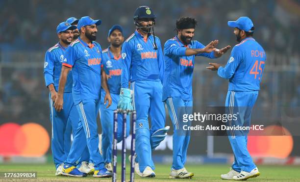 Ravi Jadeja of India celebrates the wicket of Kagiso Rabada of South Africa for their fifth wicket during the ICC Men's Cricket World Cup India 2023...