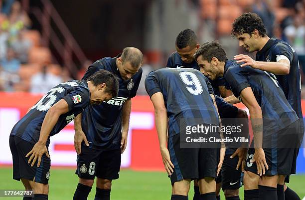 Yuto Nagatomo of FC Inter Milano celebrates with his team-mates after scoring the first goal during the Serie A match between FC Internazionale...