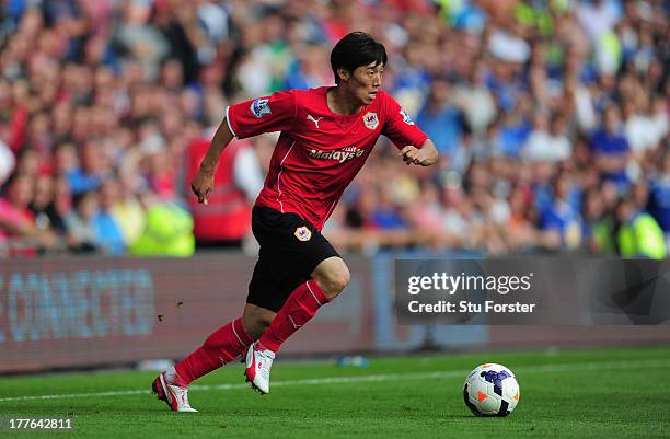 Cardiff City player Kim Bo-Kyung in action during the Barclays Premier League match between Cardiff City and Manchester City at Cardiff City Stadium...