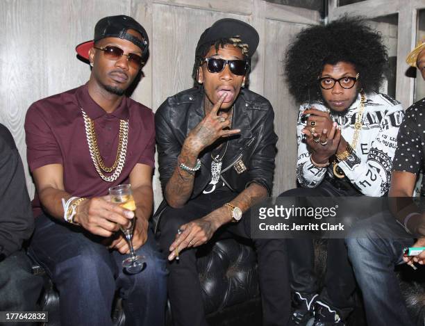 Juicy J, Wiz Khalifa and Trinidad James attend the Hennessy VS VMA Celebration at Avenue on August 24, 2013 in New York City.
