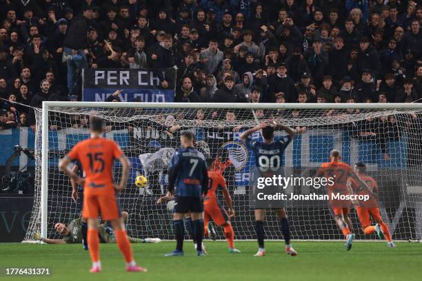 Hakan Calhanoglu of FC Internazionale scores a first half penalty to give the side a 1-0 lead during the Serie A TIM match between Atalanta BC and FC...