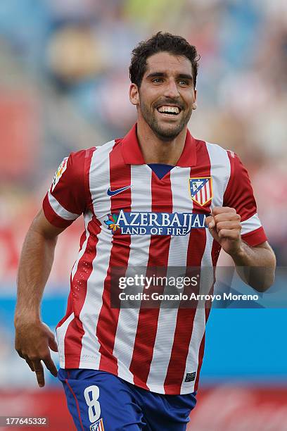 Raul Garcia of Atletico de Madrid celebrates This teammates Thiago fourth goal during the La Liga match between Club Atletico de Madrid and Rayo...