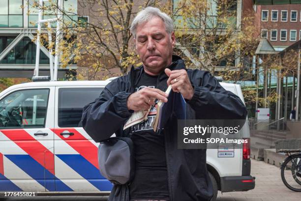 Edwin Wagensveld standing outside the court house in The Hague, tears pages from the Quran, he tore up a second copy in the court room. Edwin...