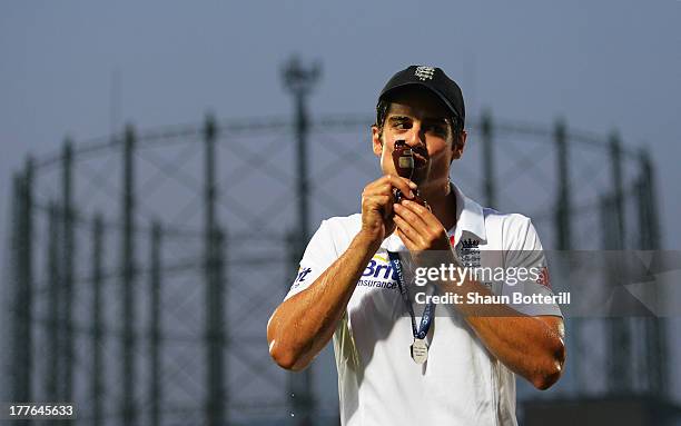 Alastair Cook of England kisses the urn after winning the Ashes during day five of the 5th Investec Ashes Test match between England and Australia at...