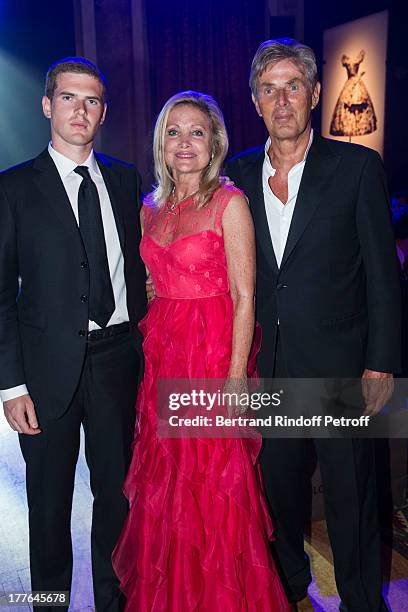 President of Barriere Group Dominique Desseigne, Baroness Gerard de Waldner and Desseigne's son Alexandre attend the Grand Bal Care In Deauville on...