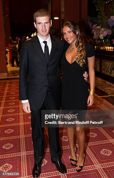 Alexandre Desseigne, the son of President of Barriere Group Dominique Desseigne and Flore Cluzel attend the Grand Bal Care in Deauville on August 24,...
