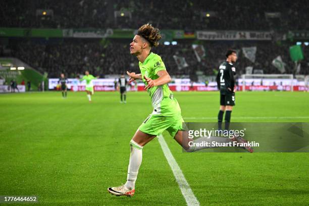 Kevin Paredes of VfL Wolfsburg celebrates after scoring the team's second goal during the Bundesliga match between VfL Wolfsburg and SV Werder Bremen...