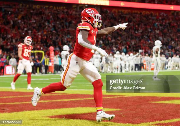 Jerick McKinnon of the Kansas City Chiefs celebrates a 17 yard touchdown in the second quarter during the NFL match between Miami Dolphins and Kansas...