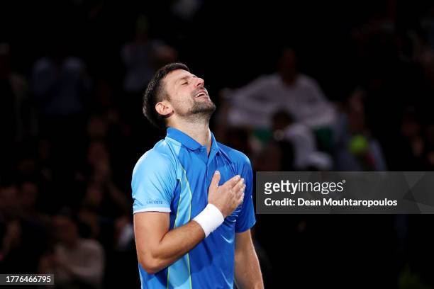 Novak Djokovic of Serbia celebrates after winning match point in the Men's Singles final against Grigor Dimitrov of Bulgaria on day seven of Rolex...
