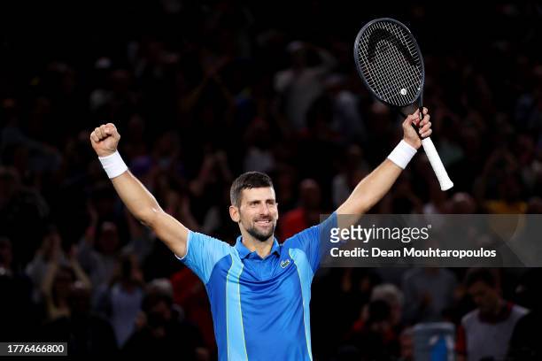 Novak Djokovic of Serbia celebrates after winning match point in the Men's Singles final against Grigor Dimitrov of Bulgaria on day seven of Rolex...