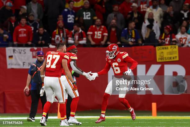 Bryan Cook of the Kansas City Chiefs celebrates a 59 yard fumble recovery touchdown in the second quarter during the NFL match between Miami Dolphins...