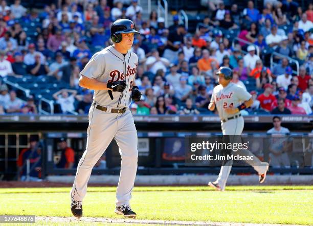Andy Dirks of the Detroit Tigers draws a ninth inning bases loaded walk against the New York Mets scoring teammate Miguel Cabrera at Citi Field on...
