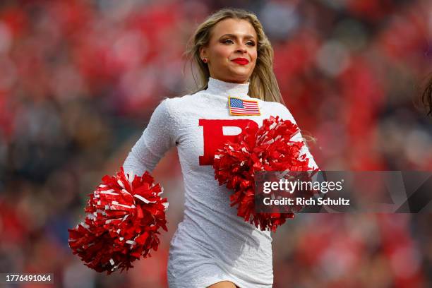 Rutgers Scarlet Knights cheerleaders in action during a college football game against the Ohio State Buckeyes at SHI Stadium on November 4, 2023 in...