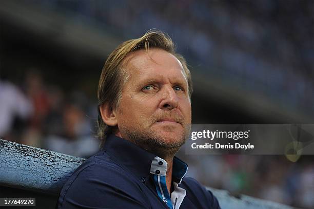 Malaga FC head coach Bernd Schuster looks on during the La Liga match between Malaga CF and FC Barcelona at La Rosaleda Stadium on August 25, 2013 in...