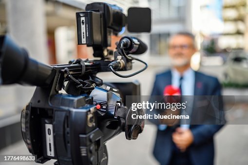 Male TV reporter
