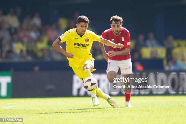 Ilias Akhomach of Villarreal CF run with the ball during the LaLiga EA Sports match between Villarreal CF and UD Las Palmas at Estadio de la Ceramica...