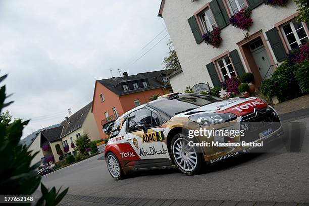 Daniel Sordo of Spain and Carlos Del Barrio of Spain compete in their Citroen Total Abu Dhabi WRT Citroen DS3 WRC during Day Four of the WRC Germany...