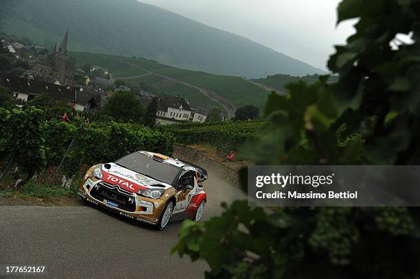 Daniel Sordo of Spain and Carlos Del Barrio of Spain compete in their Citroen Total Abu Dhabi WRT Citroen DS3 WRC during Day Four of the WRC Germany...