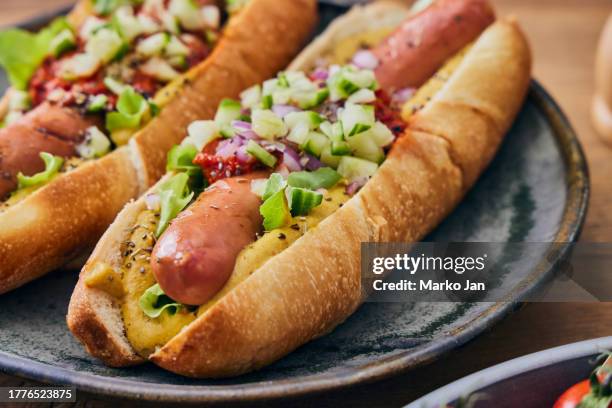bite into joy: street food elegance . street food hot dog brunch - hotdog stockfoto's en -beelden
