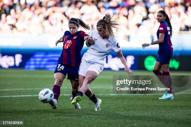 Aitana Bonmati of Fc Barcelona Femenino in action against Klara Cahynova of Sevilla FC during the Spanish league, Liga F, football match played...