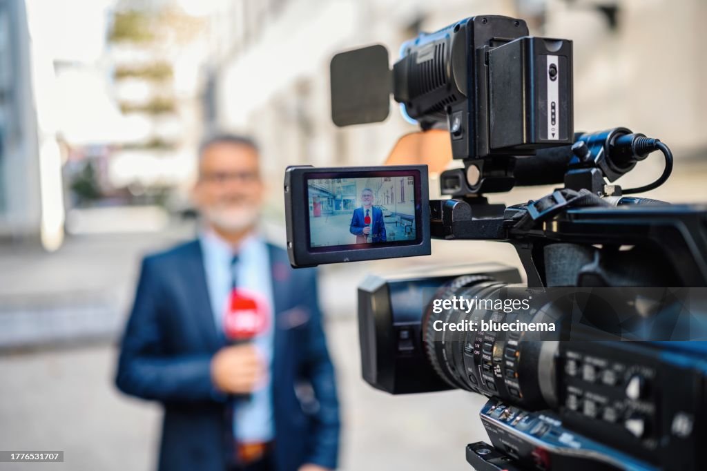 Male TV reporter