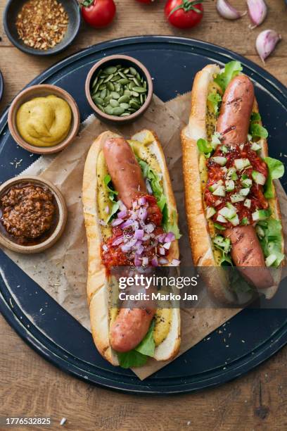 street food symphony: gourmet hot dogs barbecue brunch - hotdog stockfoto's en -beelden