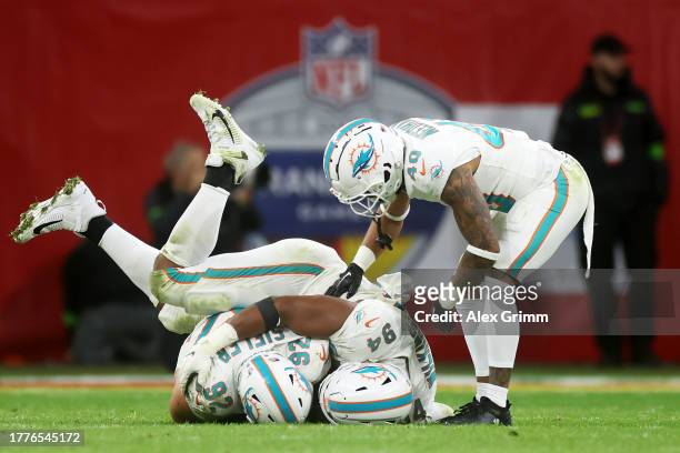 Zach Sieler of the Miami Dolphins celebrates after a fumble recovery in the third quarter during the NFL match between Miami Dolphins and Kansas City...