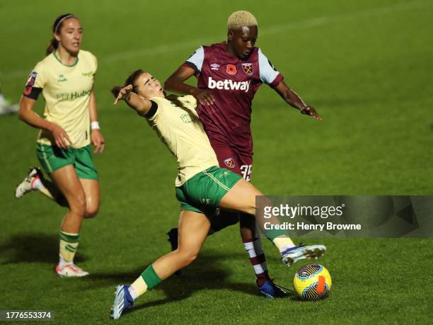 Jamie-Lee Napier of Bristol City challenges for the ball with Princess Ademiluyi of West Ham United during the Barclays Women´s Super League match...