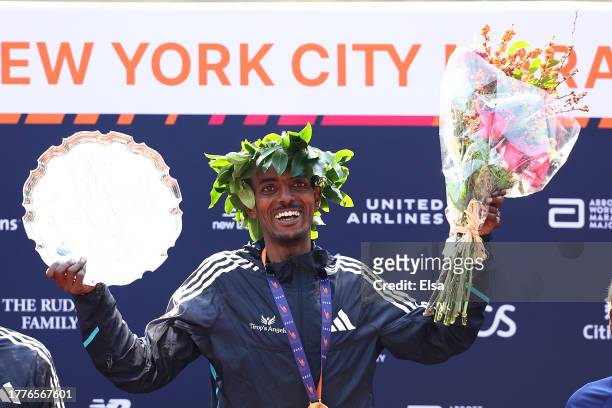 Tamirat Tola of Ethiopia celebrates after setting a course record with his win of the 2023 TCS New York City Marathon on November 05, 2023 in Central...