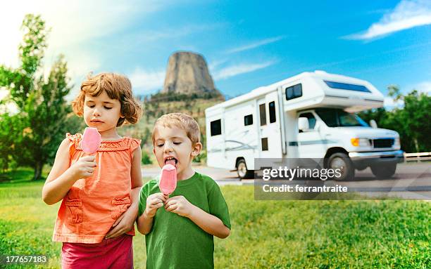 little campers on motorhome road trip - campervan stock pictures, royalty-free photos & images