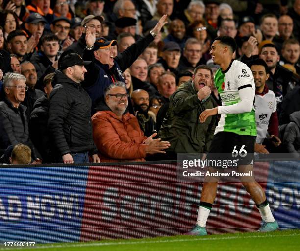 Trent Alexander-Arnold of Liverpool with Luton Town fans during the Premier League match between Luton Town and Liverpool FC at Kenilworth Road on...