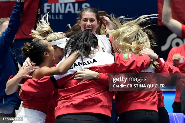 Team Canada celebrate qualifying for the final after winning the semifinal doubles tennis match between Czech Republic and Canada on the day 5 of the...