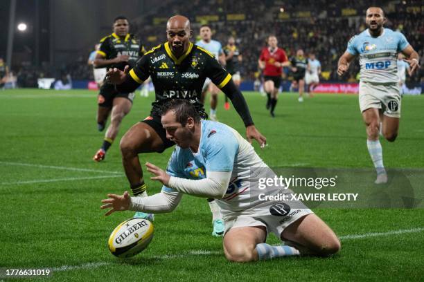 Bayonne's French fly-half Camille Lopez tries to catch the ball during the French Top14 rugby union match between Stade Rochelais and Aviron...