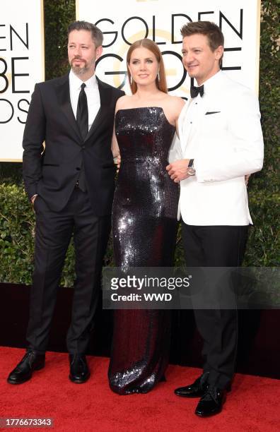 Amy Adams, Darren Le Gallo and Jeremy Renner