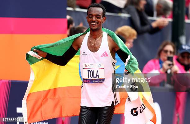 Tamirat Tola of Ethiopia celebrates the win in the Men's division and setting a course record during the 2023 TCS New York City Marathon on November...